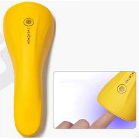 Изображение  Мини UV/LED лампа LSQ3 на аккумуляторе и с USB шнуром для сушки гель лака (гелевых типс, верхних форм), 5 Вт. Оранжевый
