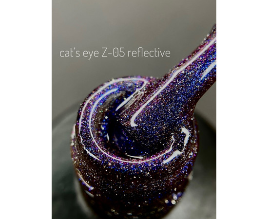 Зображення 2 Гель-лак світловідбиваючий "котяче око" ADORE prof. cat's eye 7,5 мл Z-05 синій з фіолетовими переливами, Об'єм (мл, г): 7.5, Колір: Z-05 синій з фіолетовими переливами