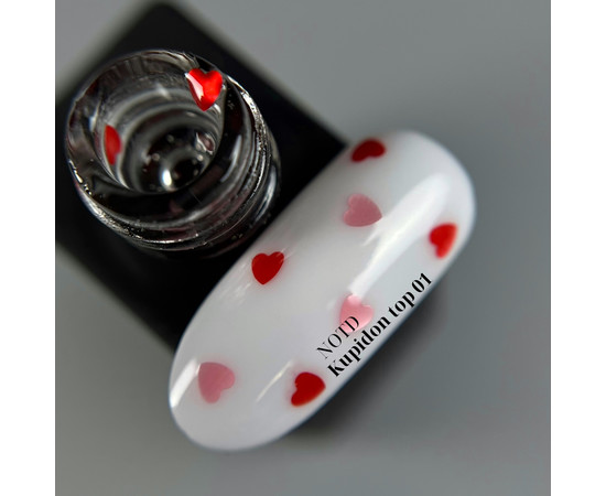 Зображення 2 Nails of the Day Kupidon top 01 - ніжне фінішне покриття для нігтів з насичено червоними та рожевими сердечками, без липкого шару, 10  мл, Об'єм (мл, г): 10, Колір: 01